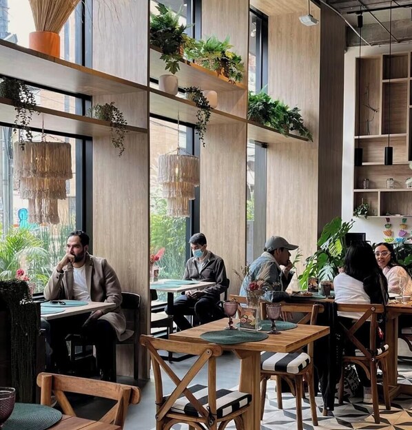 Apartment, 1 Bedroom, Accessible, Balcony | Dining - Chic Zona Rosa Loft · Rooftop & Coworking (Bogotá)
