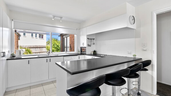 Fridge, microwave, oven, stovetop - Three Bedroom House with Ocean Views (Torquay)