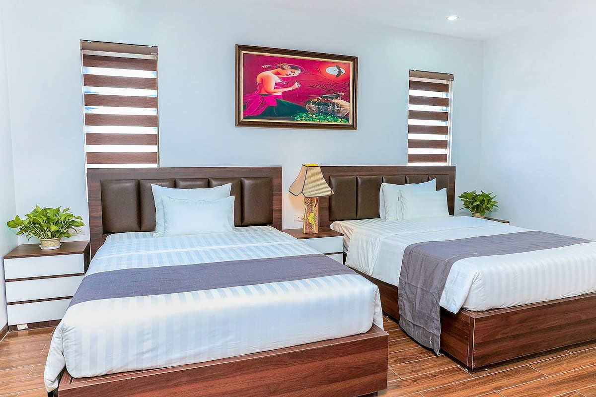 Kamar Triple Keluarga | 1 kamar tidur, brankas, meja kerja, dan ruang kerja ramah laptop