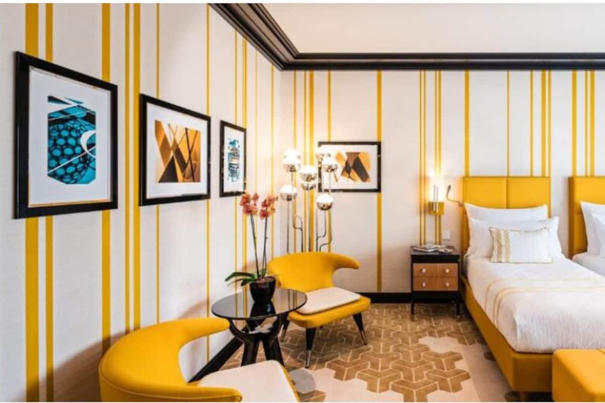 Superior Twin Room | Minibar, in-room safe, individually decorated, individually furnished