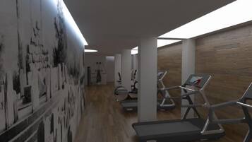 Un gimnasio moderno con cintas de correr, bicicletas estáticas y una pared de madera.