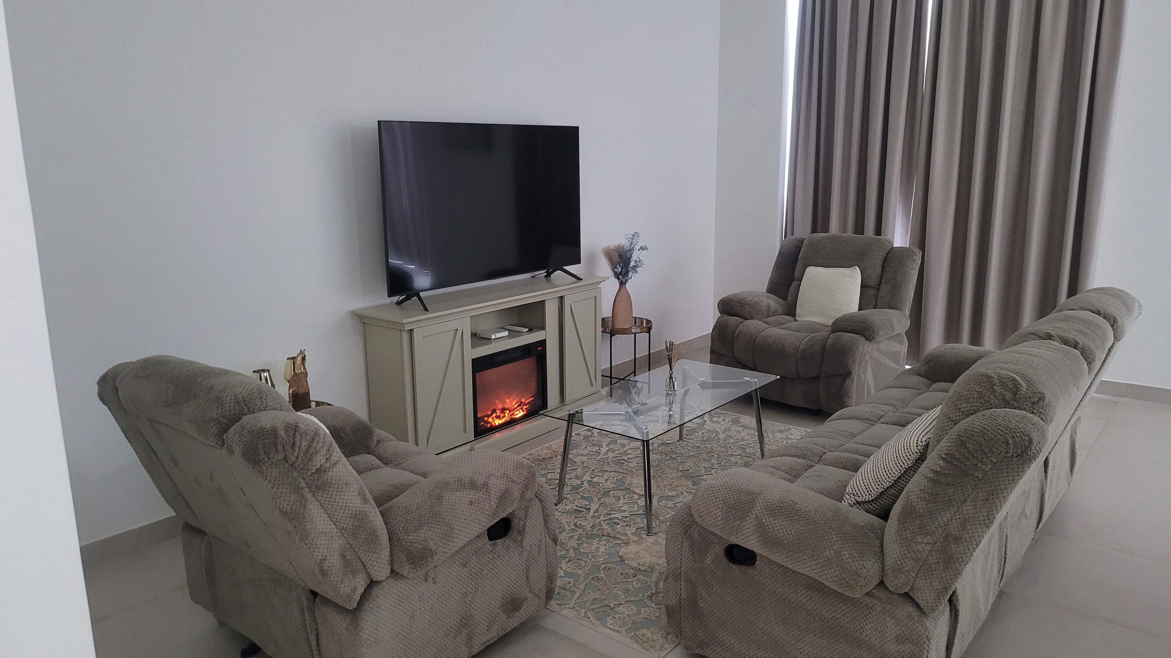 Deluxe Villa | Living area | 60-inch Smart TV with digital channels, printers