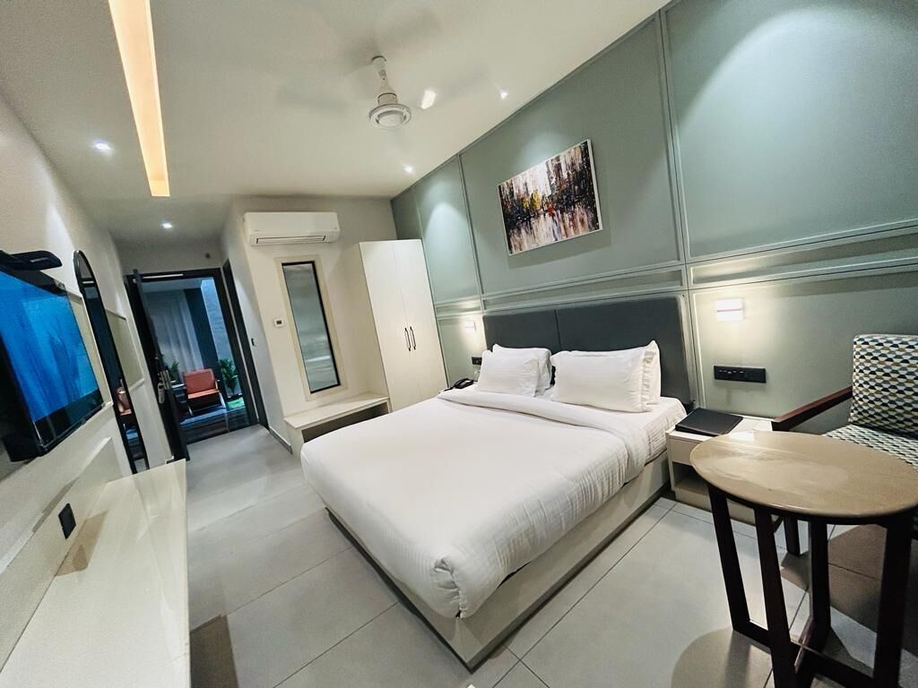 Desk, laptop workspace, blackout curtains, soundproofing