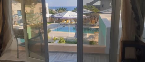 Suite Deluxe, varias habitaciones, vista al mar | Terraza o patio