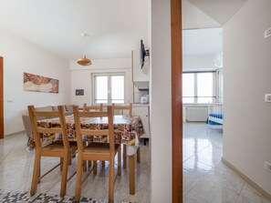 Apartment, Balcony, Sea View | Living area | 32-inch flat-screen TV with digital channels