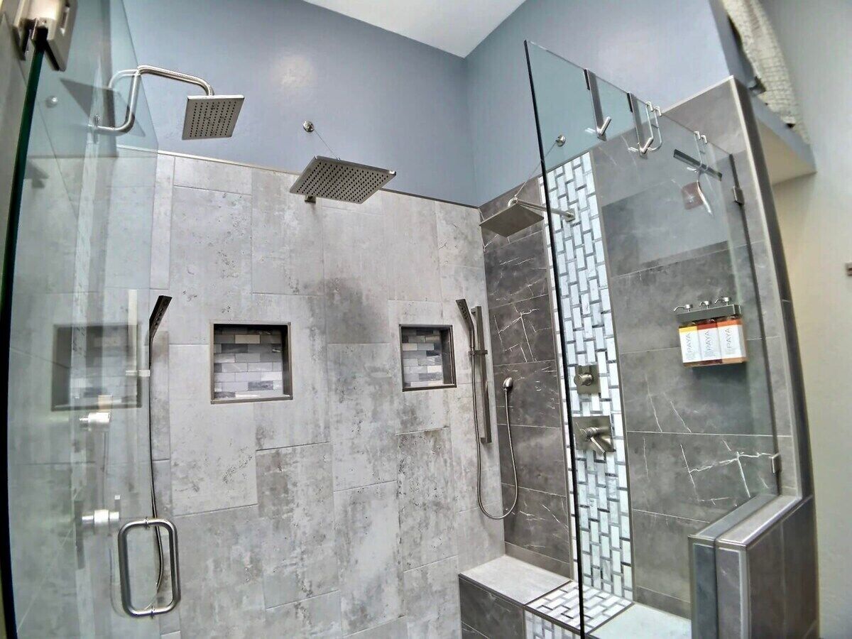 Shower, hair dryer, towels, shampoo