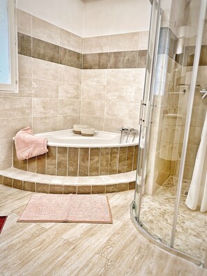 Shower, hair dryer, towels, soap