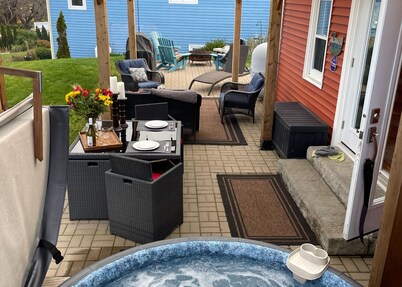 Relax on the South Shore, steps from 2 beaches, ocean views & hot tub.