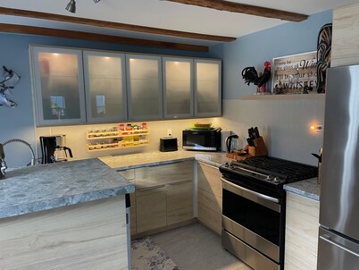 Relax on the South Shore, steps from 2 beaches, ocean views & hot tub.