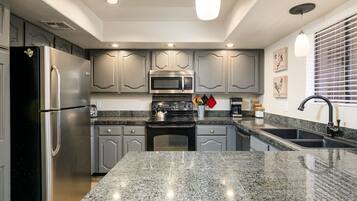 Condo, 2 Bedrooms | Private kitchen | Fridge, oven, coffee/tea maker, toaster