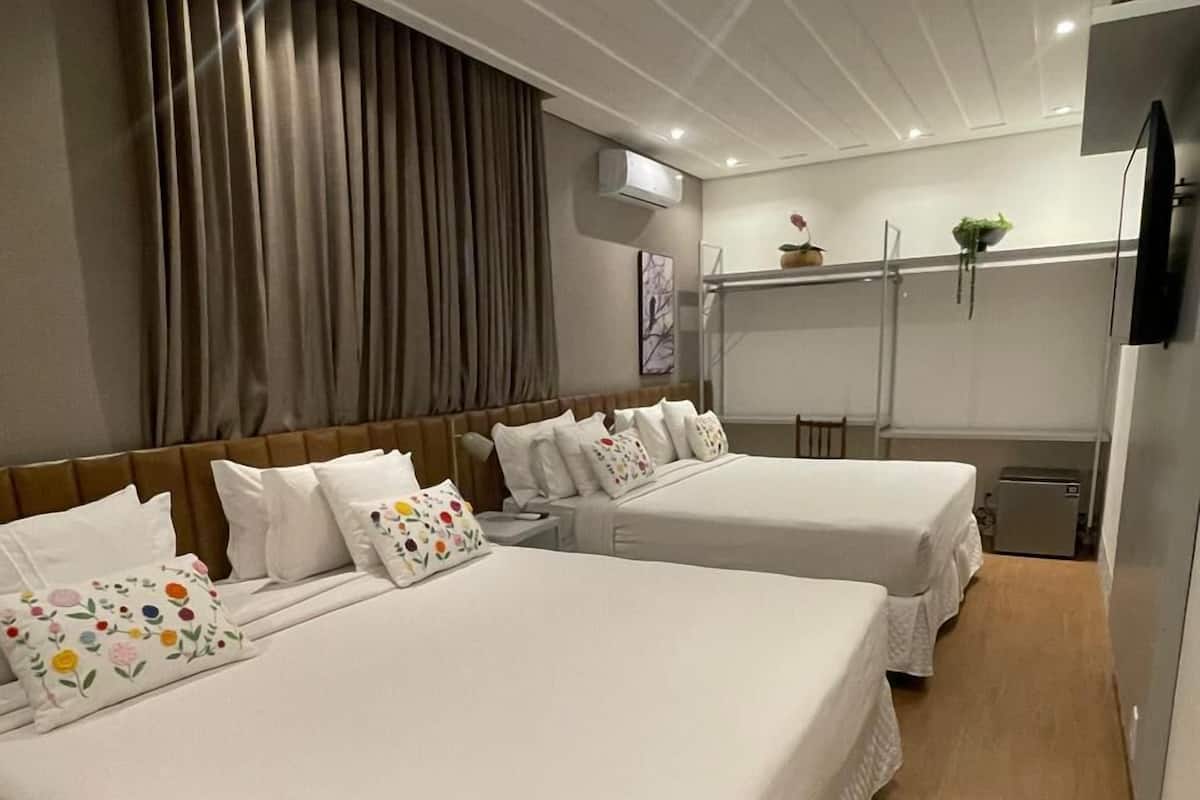 Deluxe Quadruple Room | 1 bedroom, minibar, desk, laptop workspace