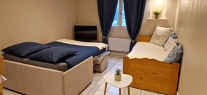 1 bedroom, travel crib, bed sheets