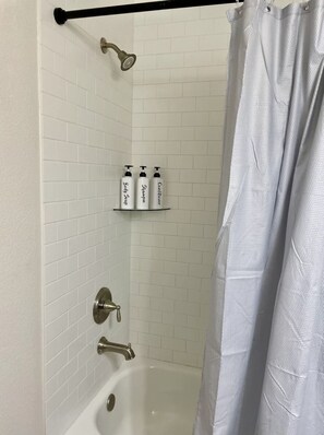 Hair dryer, towels, soap, shampoo