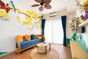 2 Bedroom Apartment with Balony | Living area | 45-inch Smart TV with cable channels, pay films - HAYA SOHO SAIGON (Ho Chi Minh City)