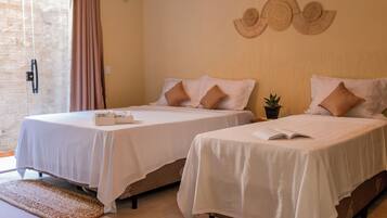 Suíte standard | 1 quarto, frigobar, Wi-Fi de cortesia, roupa de cama