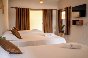 Suite Deluks | 1 kamar tidur, minibar, Wi-Fi gratis, dan seprai linen