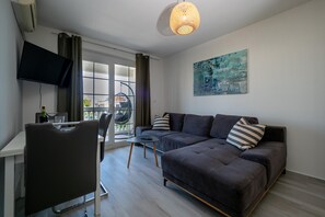 Apartamento, 1 quarto | Área de estar