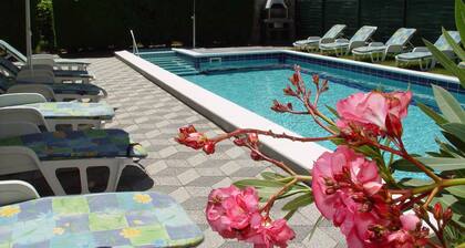 Holiday home with outdoor pool and air conditioning
