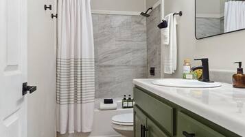 Hair dryer, towels, soap, shampoo