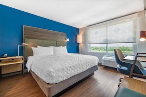 Ropa de cama hipoalergénica y espacio para trabajar con un portátil