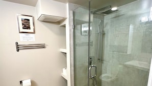A modern bathroom with a glass-enclosed shower, a toilet, a towel rack, and a framed picture on the wall. -
Pvt Studio near Fairway Mall & Waterloo Airport. Downtown in few minutes (Kitchener)