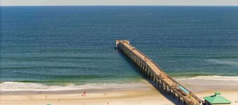 Quiet coastal condo - walk to the beach!