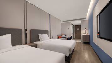 Premium bedding, down comforters, minibar, desk