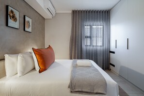 1 chambre, coffres-forts dans les chambres, fer et planche à repasser