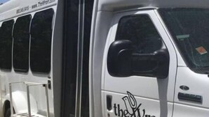 A white RV with a sliding door, labeled "the Wren" on the side. - The Wren Studio VAIL WALK toLIFT (Vail)