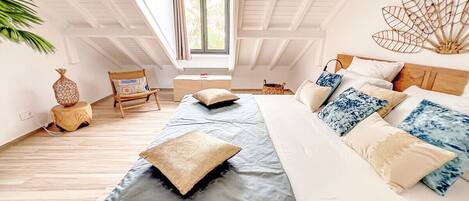 1 bedroom, desk, iron/ironing board, travel crib