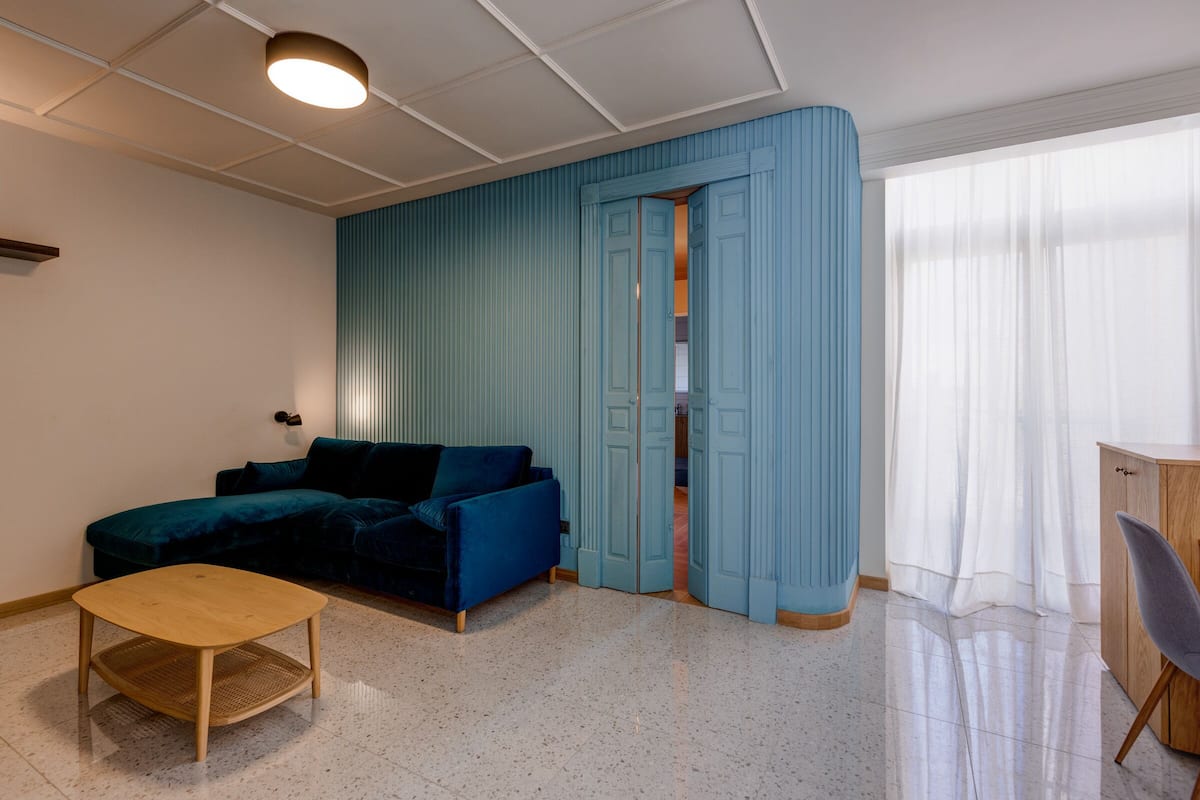Appartement Prestige | Aire de séjour | Téléviseur à écran plat