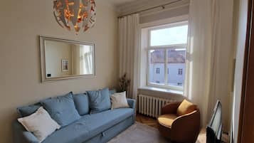 Apartamento panorâmico | Área de estar | TV de tela plana, Netflix, filmes pagos, serviços de streaming