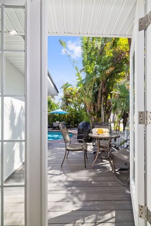 Outdoor dining - Modern Beach House: 200 Steps to Gulf Sand + Private Heated Pool (Holmes Beach)