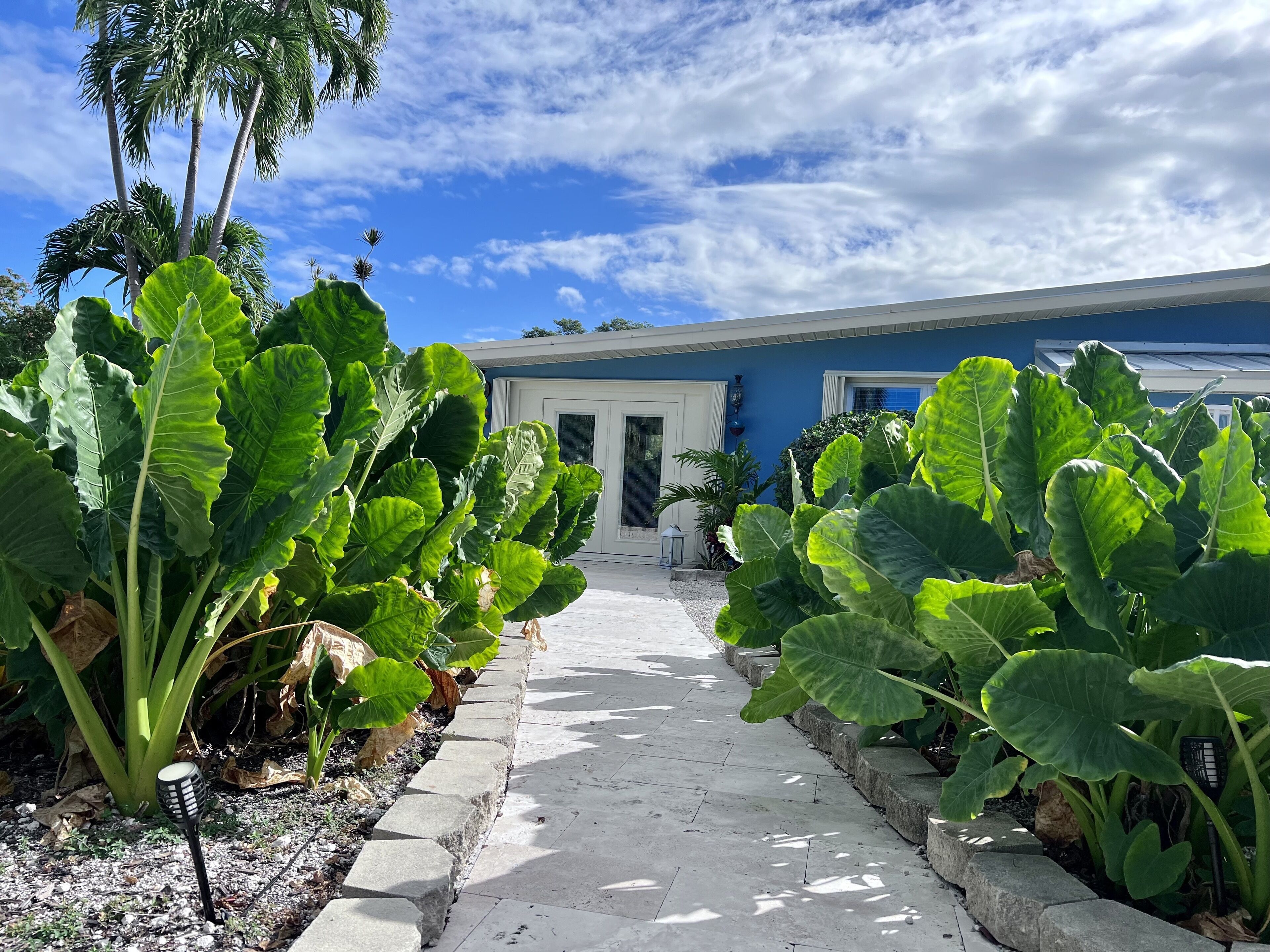 Escape to the Florida Keys to this tropical canal-front home with boat dockage.
