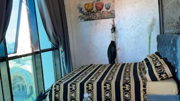 1 dormitorio, tabla de planchar con plancha, wifi gratis y ropa de cama