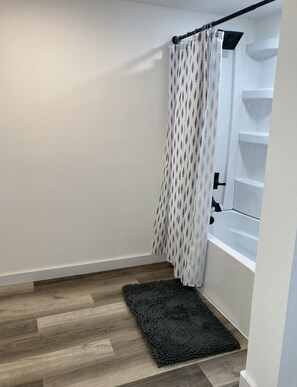 Shower, towels, soap, toilet paper