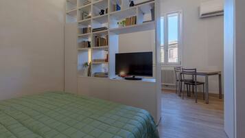 1 chambre, fer et planche Ă repasser, Wi-Fi, draps fournis