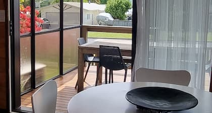 The Bach in old Wharewaka well located for a fabulous lake holiday.