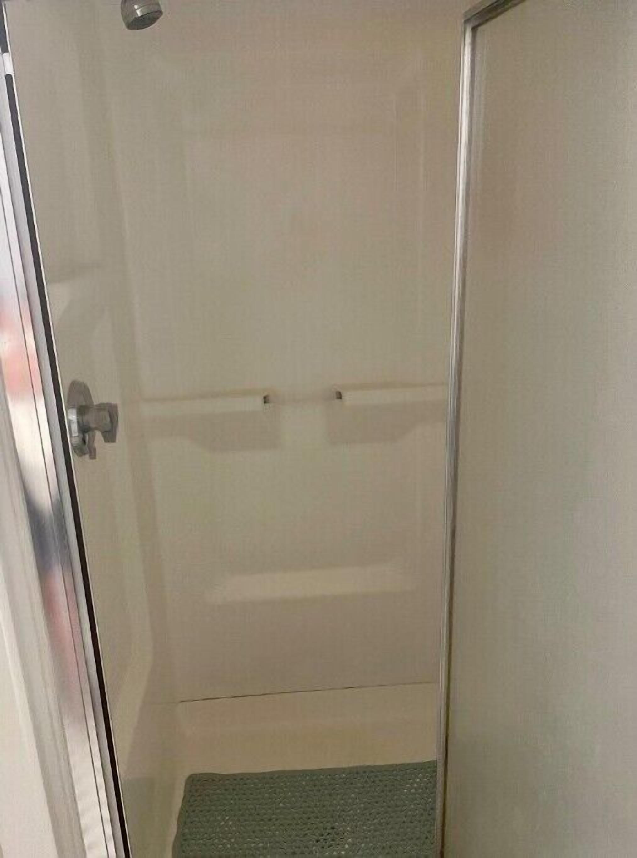 Shower, towels, toilet paper