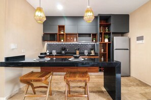 Fridge, microwave, coffee/tea maker, electric kettle