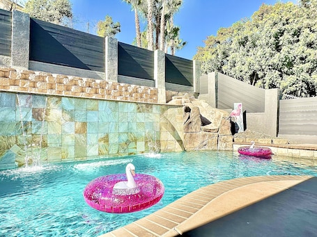 Outdoor pool, a heated pool. Sleeps 50+ NEW Luxury Private Resort with Pool Golf Arcade Spa Playground Poker