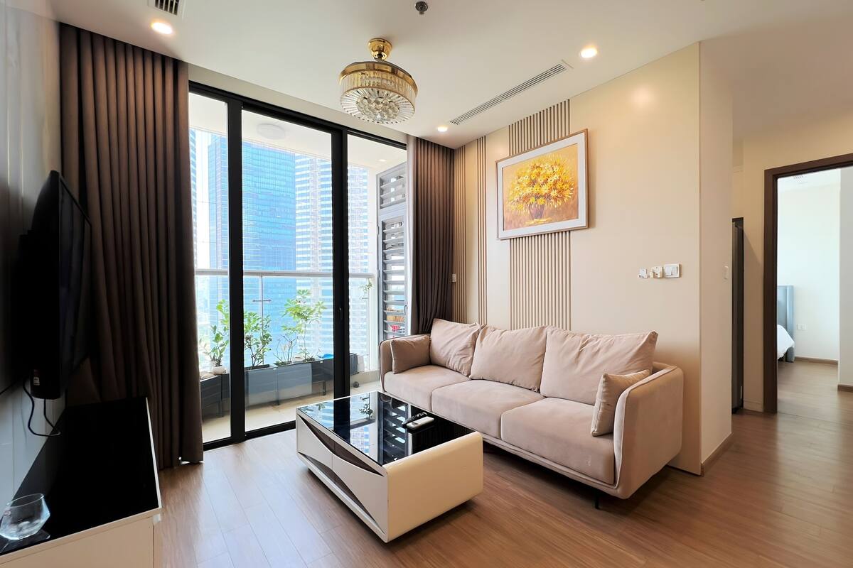Deluxe Apartment, 2 Bedrooms | Living area | 40-inch flat-screen TV with cable channels, fireplace, Netflix
