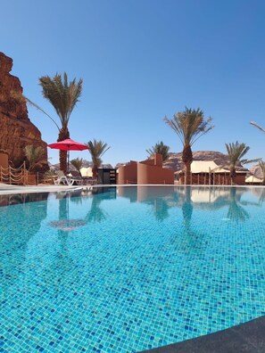 Outdoor pool, pool umbrellas, sun loungers
