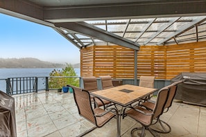 Outdoor dining - Lakefront home with canoe, kayaks, large deck, beach access, fireplace, & W/D (Olympia)