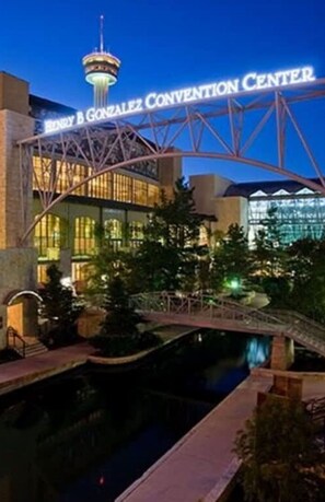 The Henry B. Gonzalez Convention Center with a bridge over a water feature. - Exquisite Studio Guesthouse Near Downtown s Core (San Antonio)