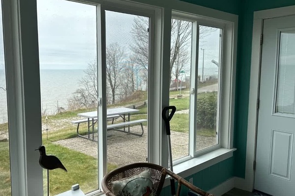Bask in natural light in our cozy sunroom—your go-to space for morning coffee, reading, or simply soaking up peaceful vibes. Surrounded by windows and filled with warmth, it’s the perfect spot to relax, recharge, and enjoy the beauty of the day. ☀️🪟