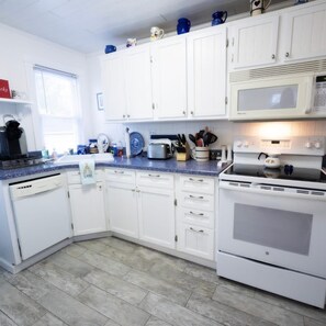 Fridge, microwave, dishwasher, coffee/tea maker