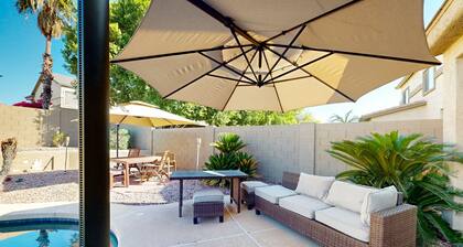 Spacious home surrounded by palms with pool, grill, children's items, & W/D