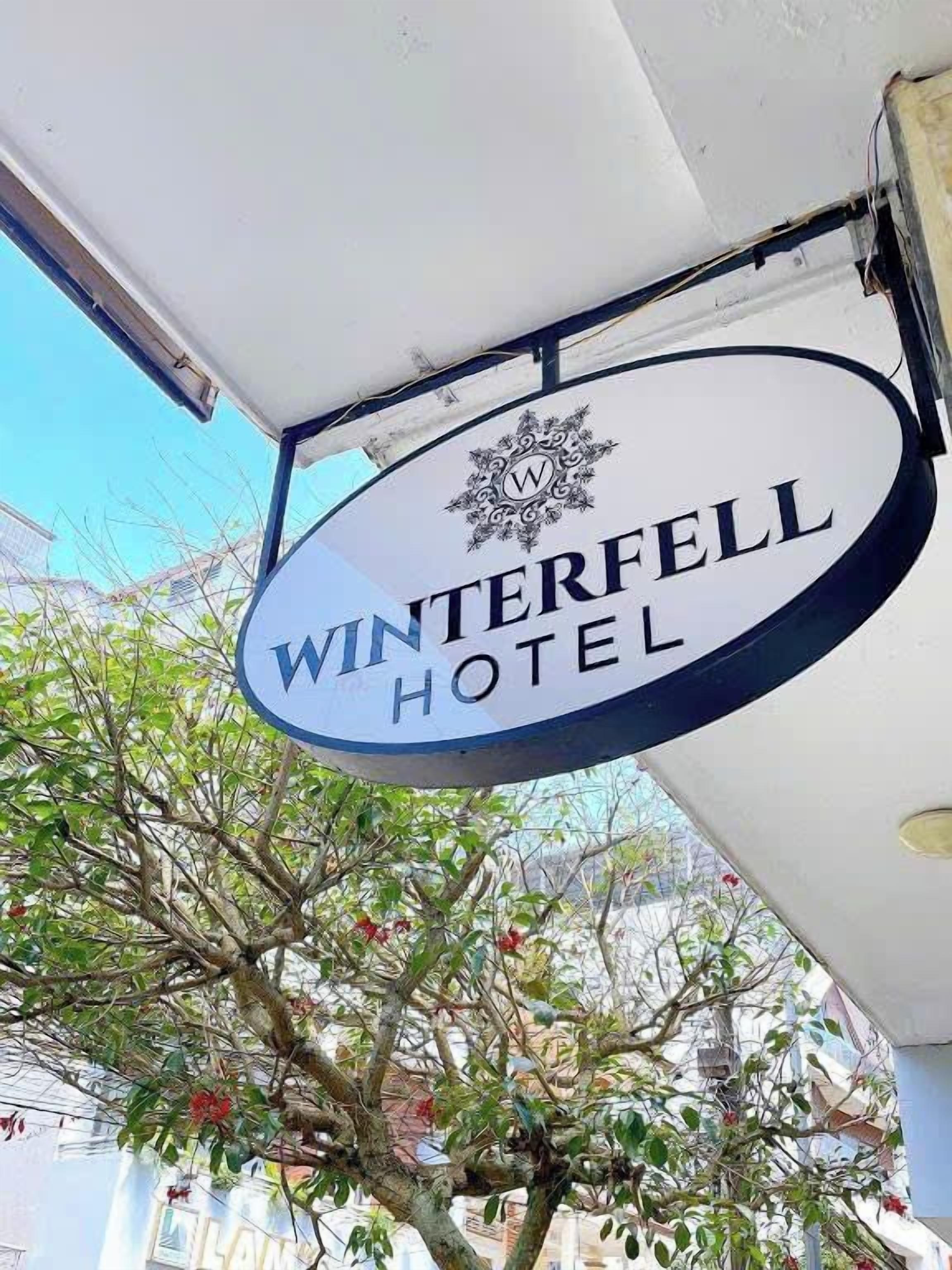 A sign for the Winterfell Hotel.