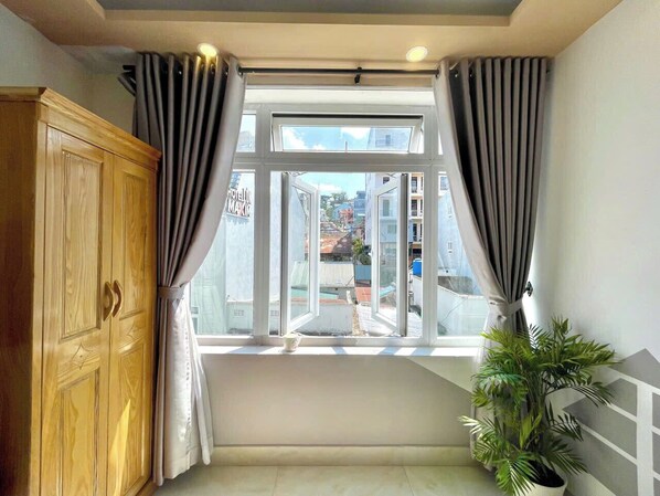 Deluxe Double or Twin Room, 2 Queen Beds, City View | Terrace/patio